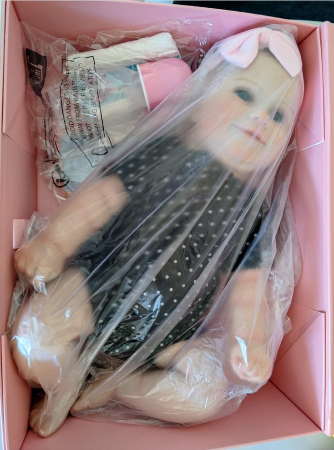 Customer photo review of "Callie" – 19-Inch Smiling Reborn Baby Doll Full Vinyl Body