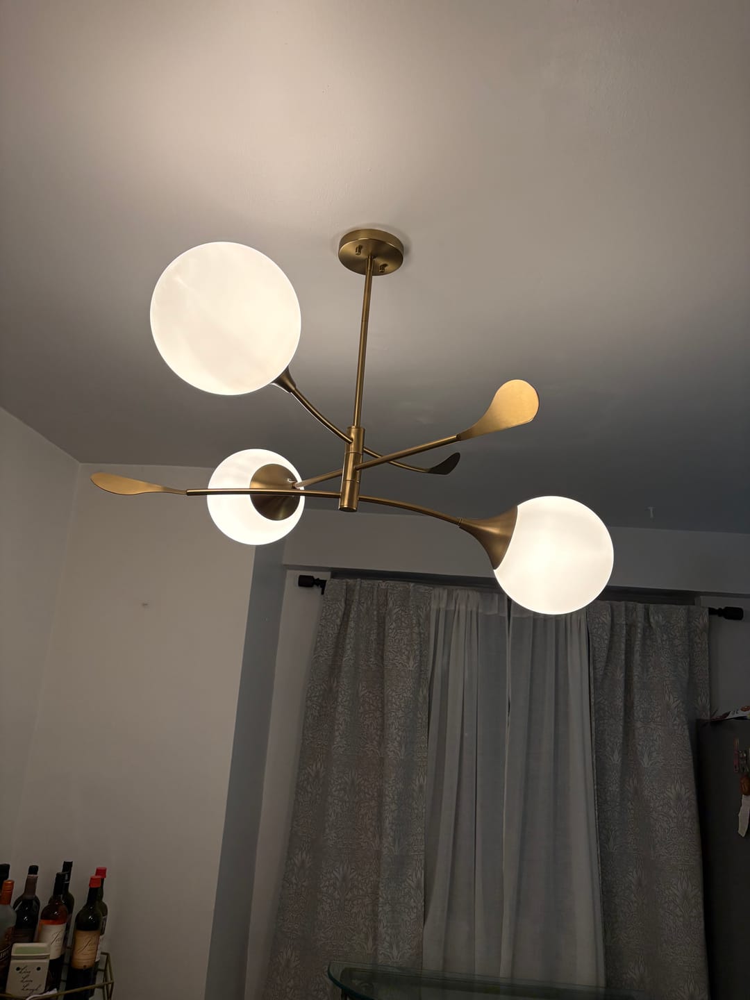 Customer photo review of Wind-Vane Tiered 3-Light Opal Glass Globe Sputnik Chandelier