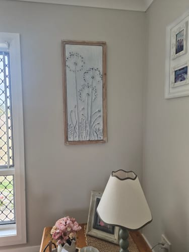 Customer's Hannah French Provincial metal wall art in white floral design mounted on a light-colored indoor wall.
