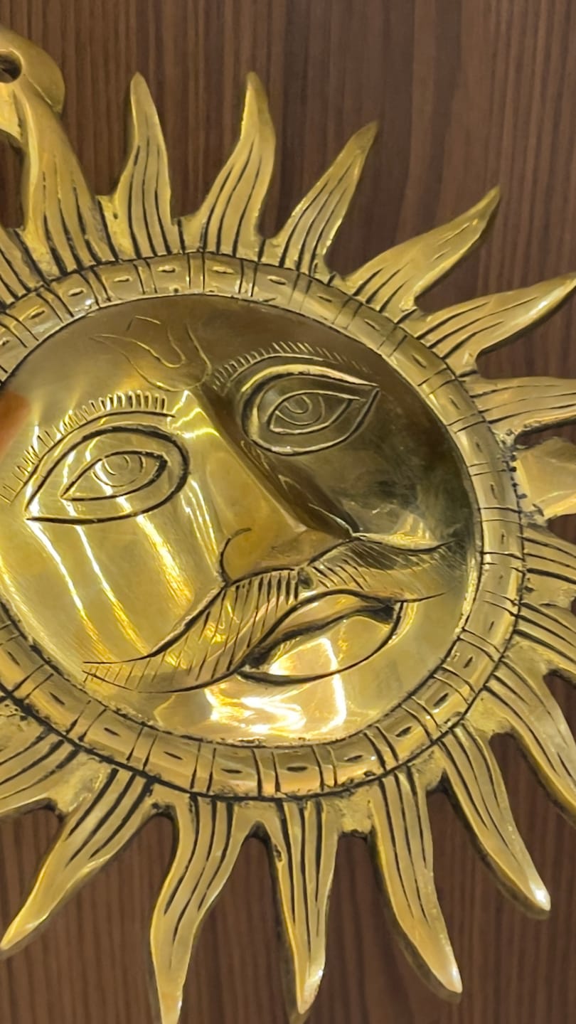 Customer photo review of Brass Surya (Sun) Ji Wall Hanging Idol Vastu Remedy for East Direction Balance, Fame and Positive Energy | 24 X 24 cm | 1 kg