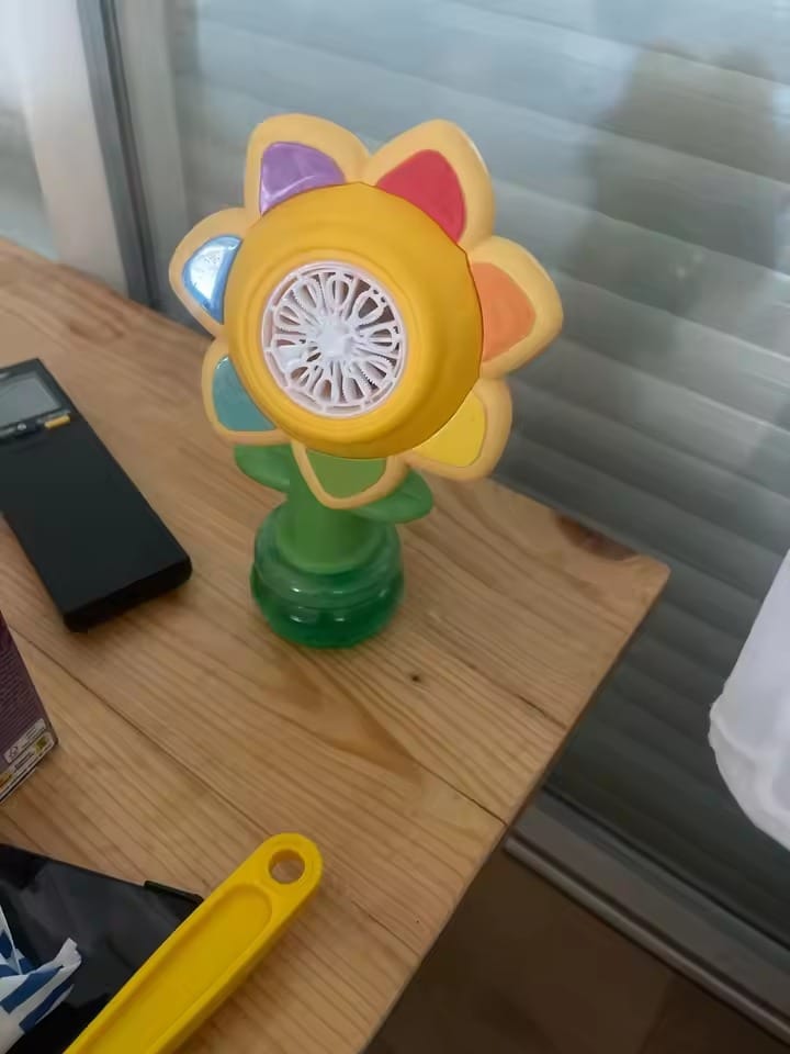 Customer photo review of BloomBubble™ Dancing Sunflower Bubble Machine — Lights Up & Swings