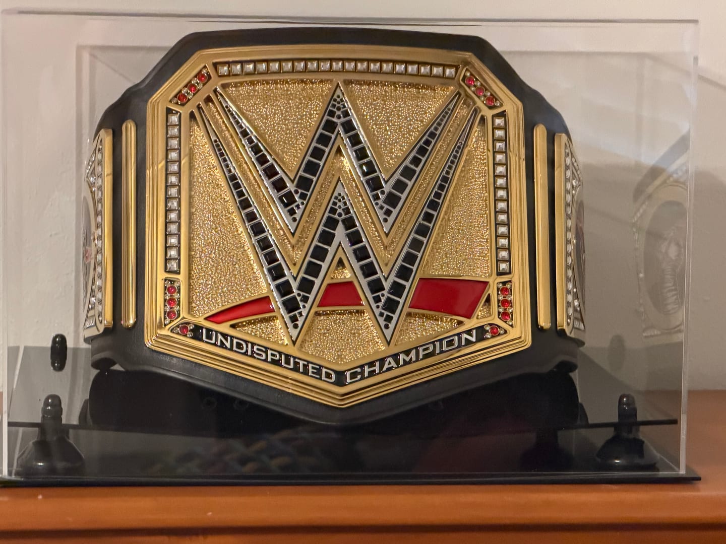 Customer photo review of Clear Acrylic Wrestling Belt Display Case - Clear (A014/V60)