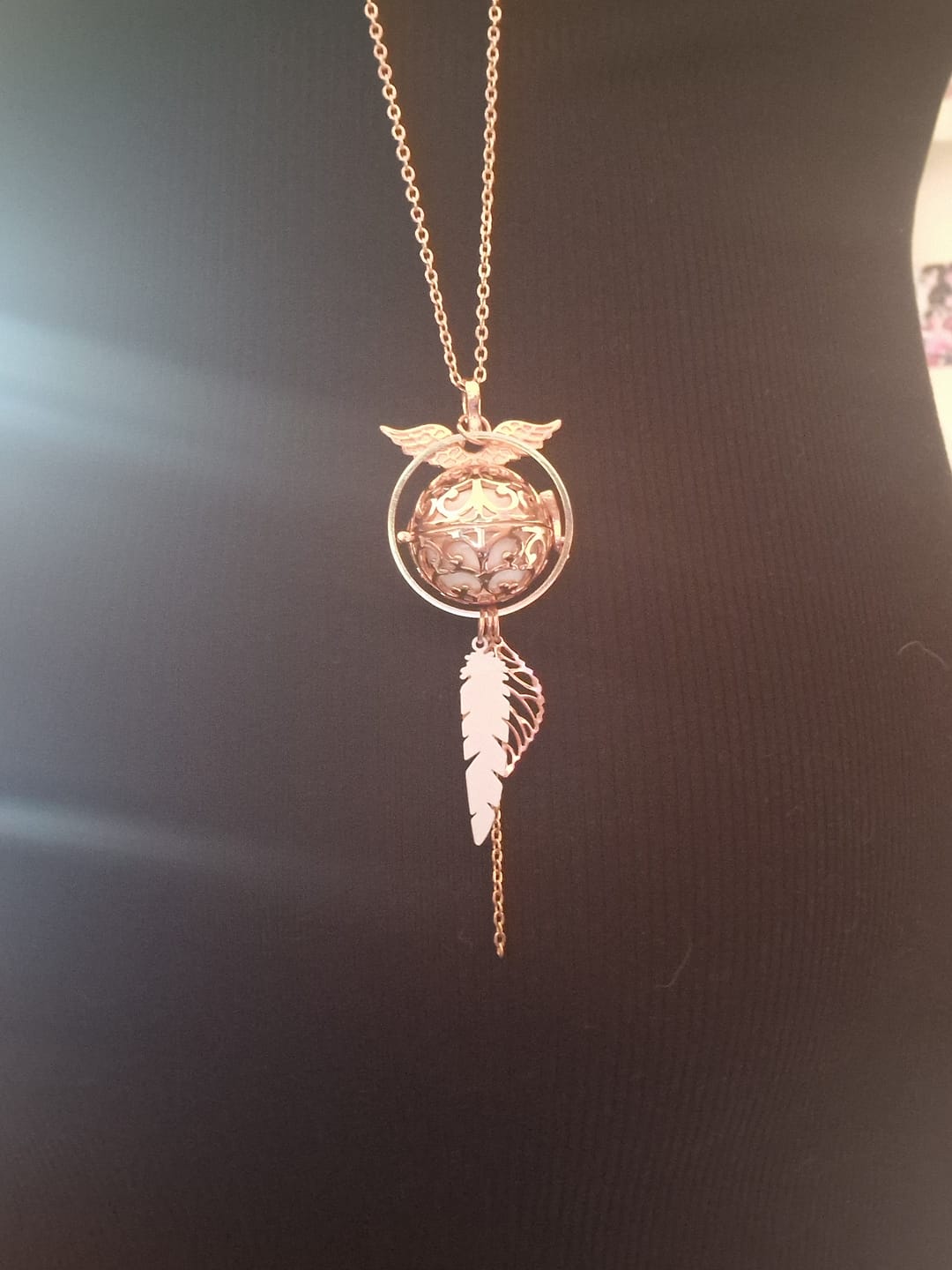 Customer photo review of Bola de grossesse doré rose cage ange anneau pendentif feuille plume