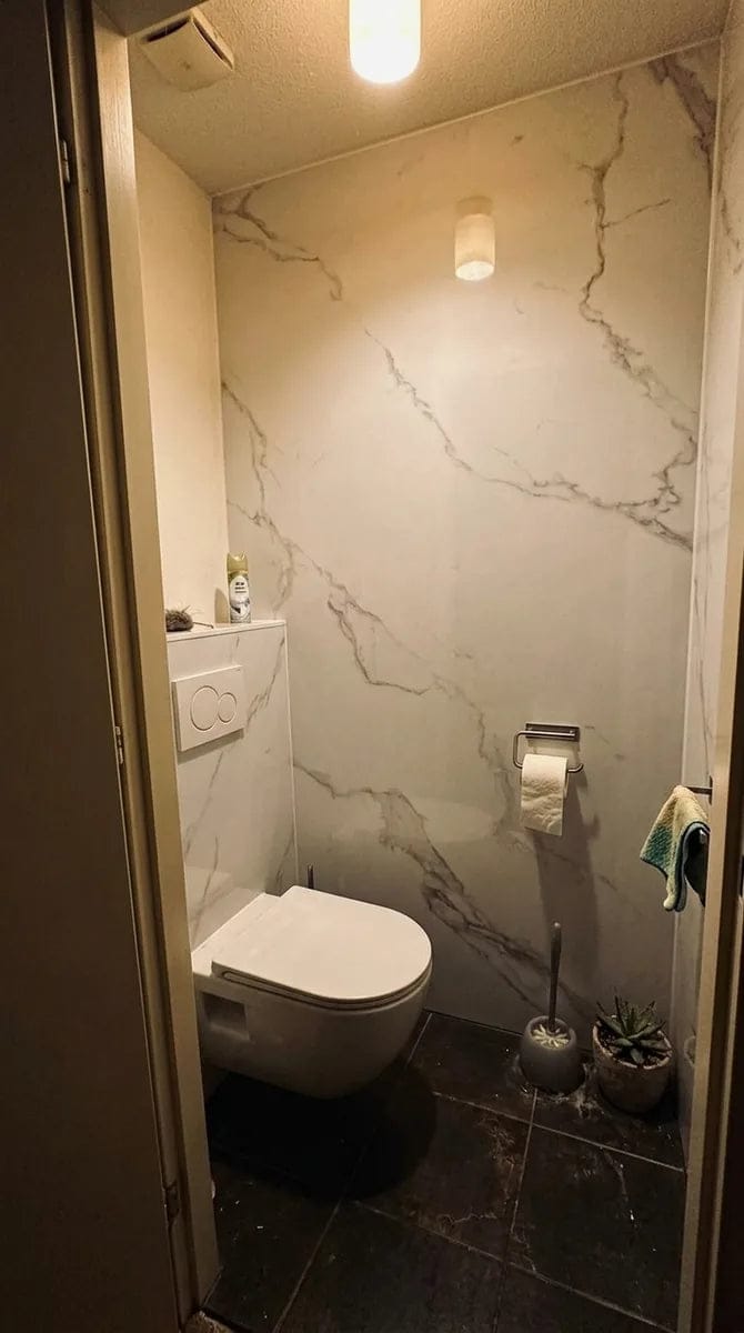 Customer photo review of Panneau PVC - Effet Marbre Blanc - 250 x 120 cm – 100% Imperméable - 15 ans Garantie
