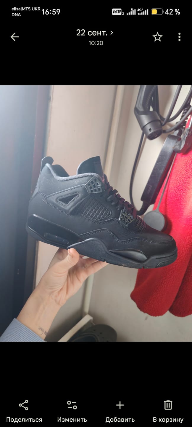 Customer photo review of Air Jordan 4 Retro Black Cat (2025)