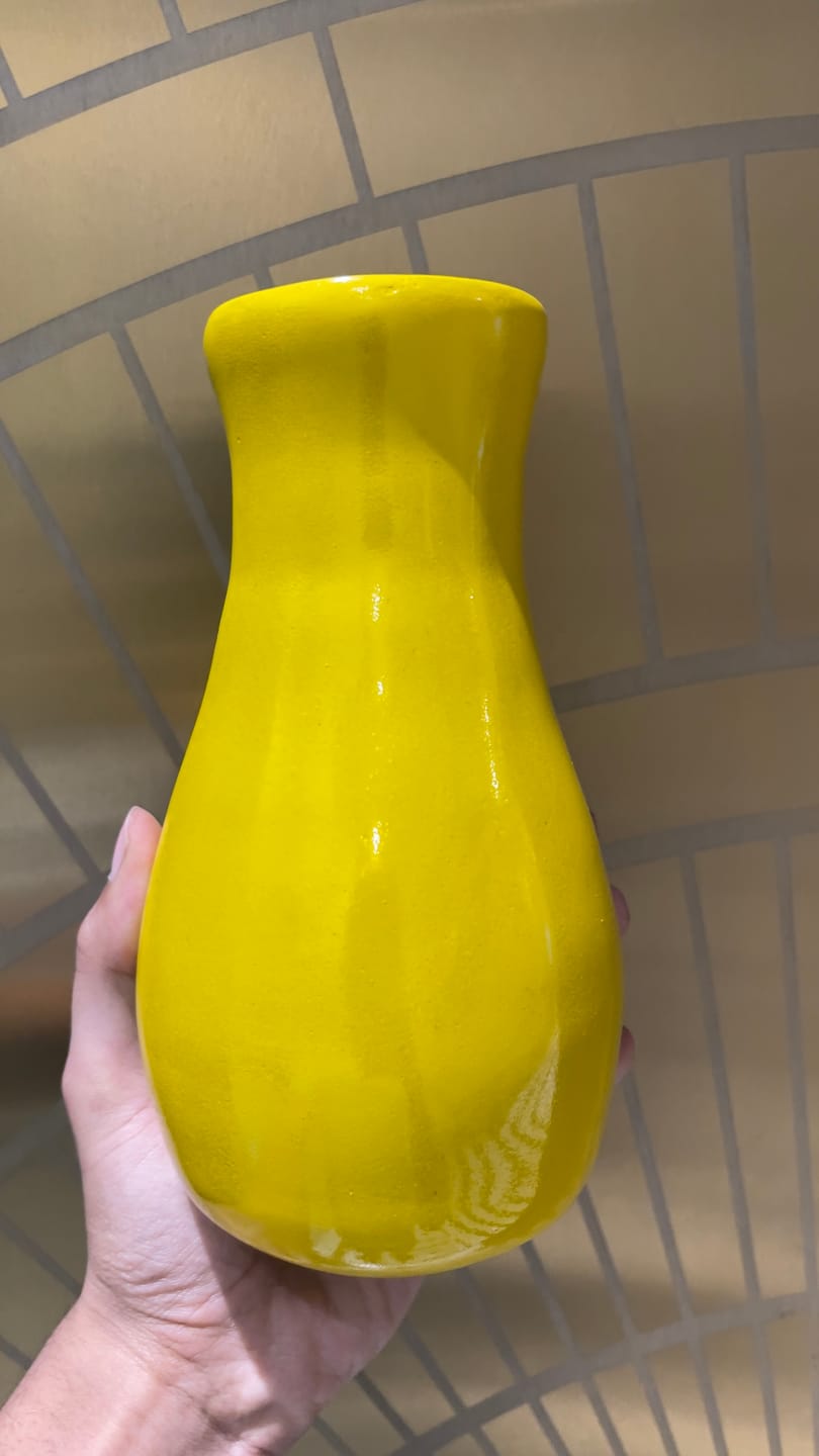Customer photo review of Bright Yellow Decorative Resin Vase Sculpture Vastu Remedy for Positive Energy Balance and Interior Harmony for Living Room, Office and Home Decor | 6.3 x 20 cm | 230 gm
