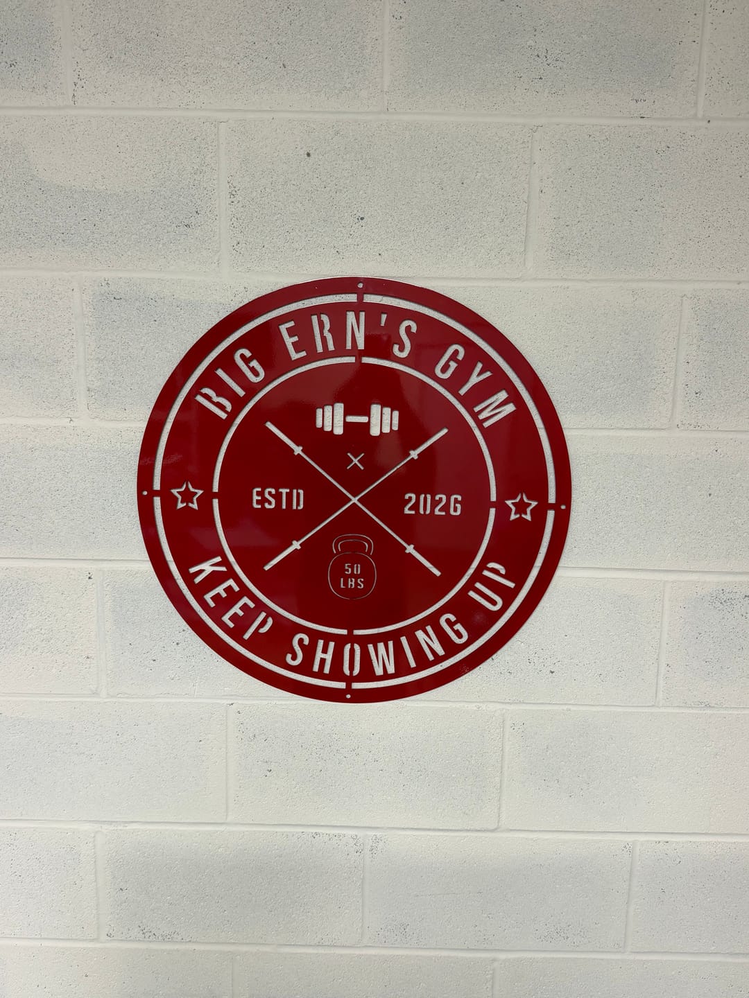 Customer photo review of Crossed Barbell Gym Sign