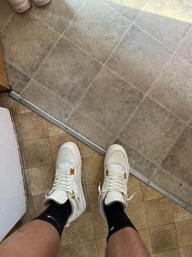Customer photo review of Air Jordan 4 Metallic Gold