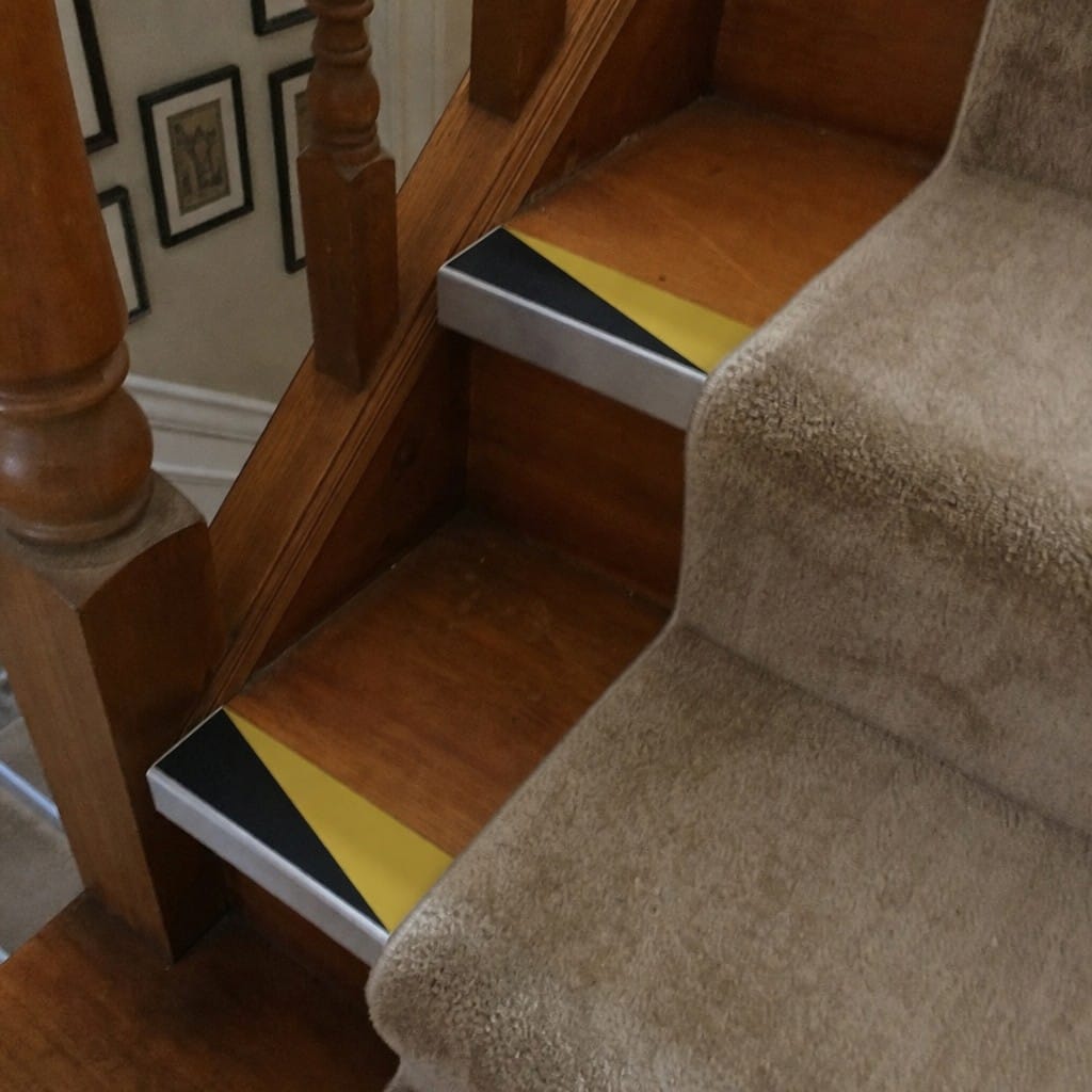 Customer photo review of Carpet Stair Nosing 2.44m Aluminium Rake Back PVC Insert