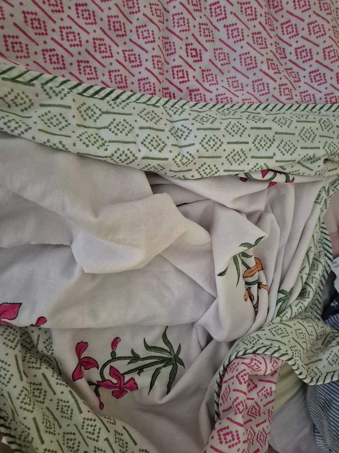 Customer photo review of Plum Organic Mulmul Blanket — Hand Block Printed