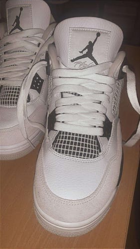 Customer photo review of Air Jordan 4 Military Black