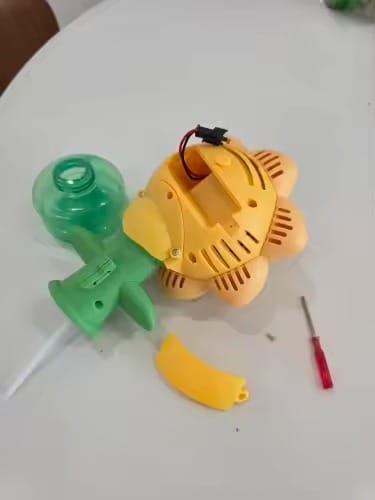 Customer photo review of BloomBubble™ Dancing Sunflower Bubble Machine — Lights Up & Swings