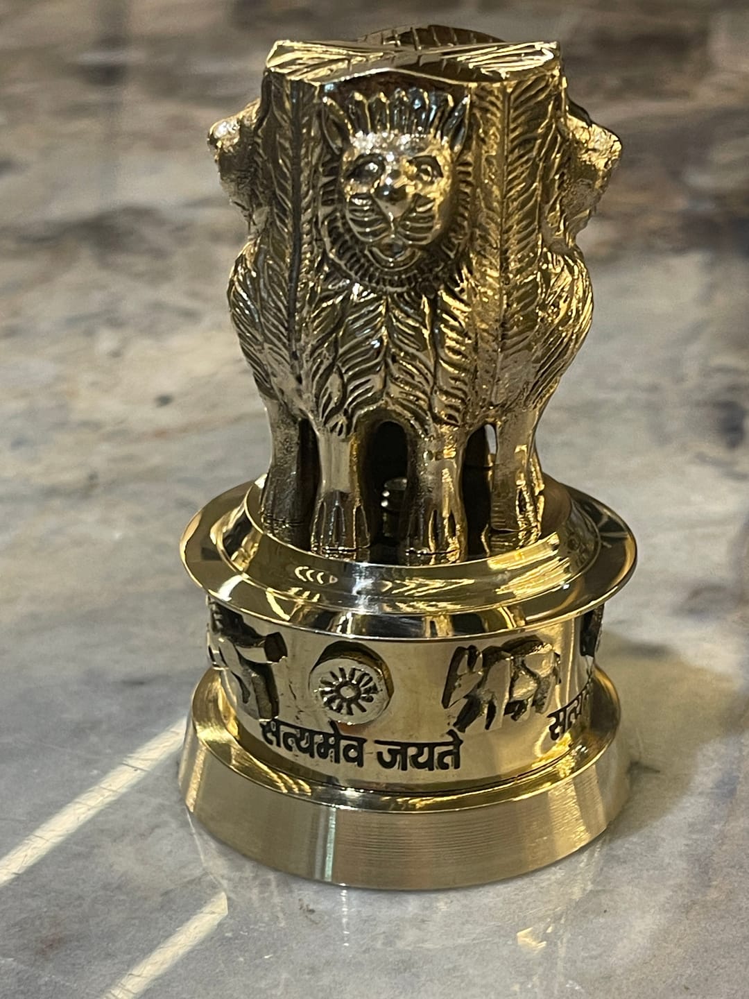 Customer photo review of Brass Ashoka Stambh Idol Vastu Remedy for Authority, Recognition and Government Support for Home, Office Desk and Institutional Spaces | 3 - 7 inch |