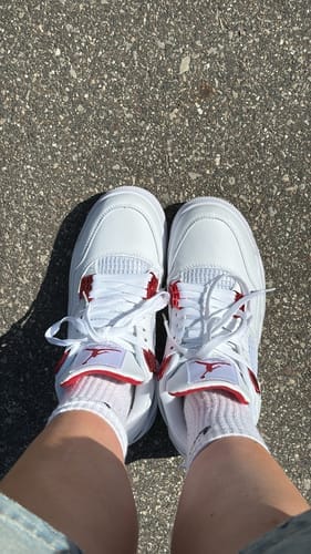 Customer photo review of Air Jordan 4 Metalic Red