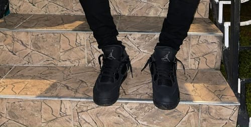 Customer photo review of Air Jordan 4 Black Cat