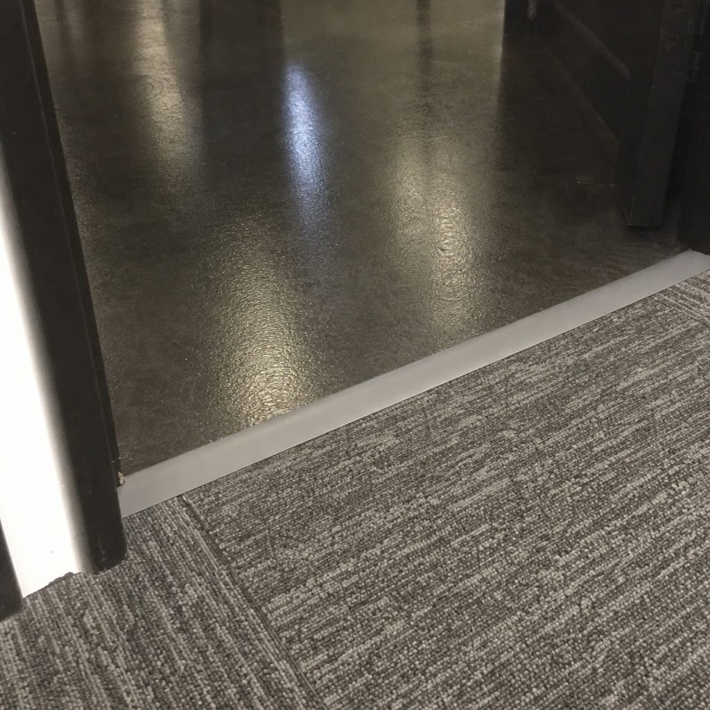 Customer photo review of Self-Adhesive PVC Floor Transition Strip | Carpet to Laminate Threshold