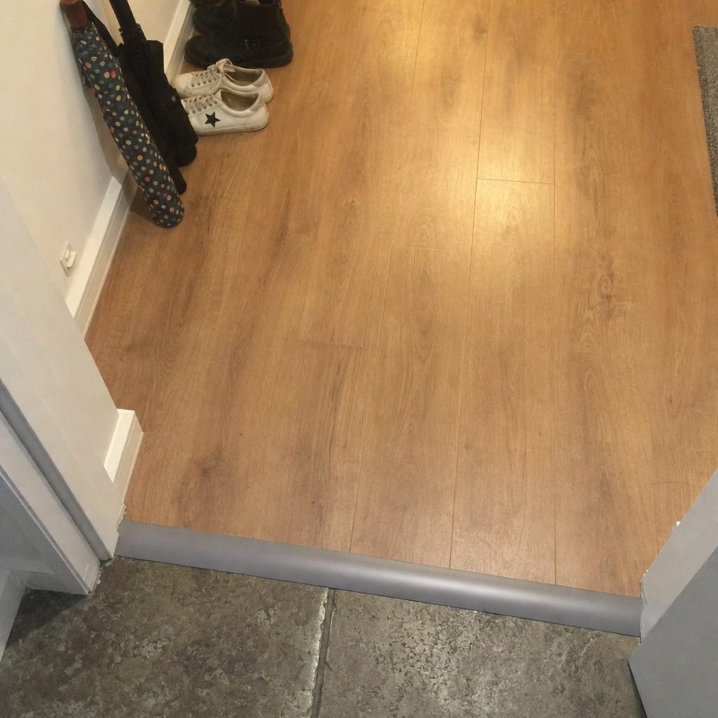 Customer photo review of Self-Adhesive PVC Floor Transition Strip | Carpet to Laminate Threshold