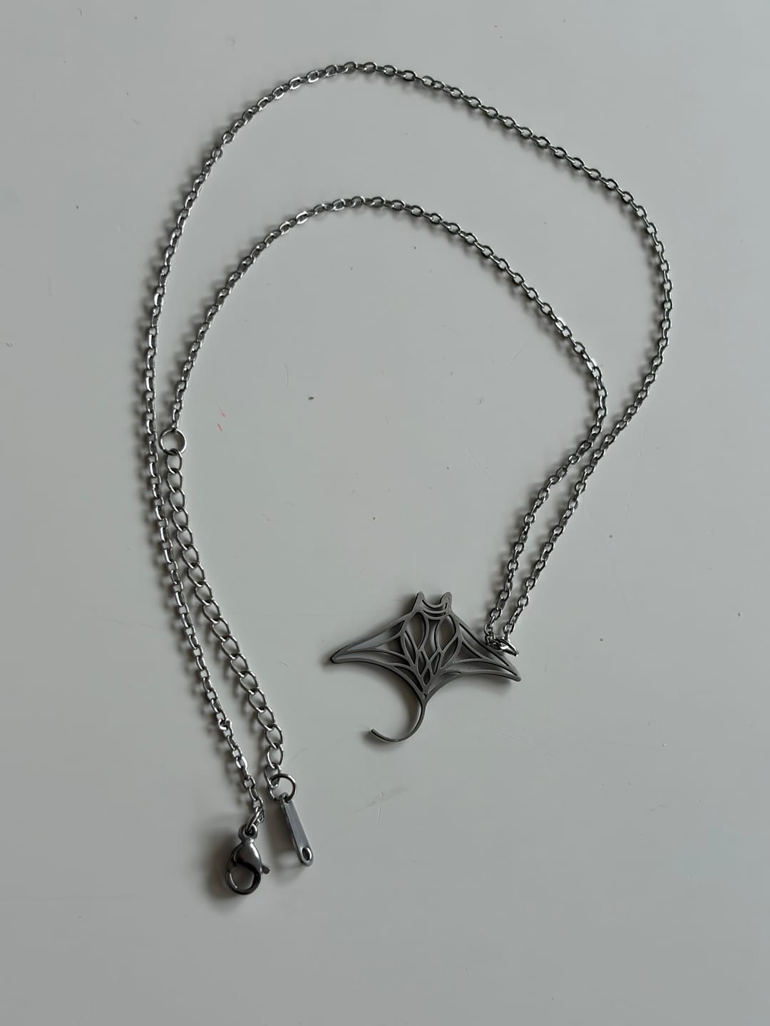 Customer photo review of Manta Ray Necklace with silver or gold manta pendant