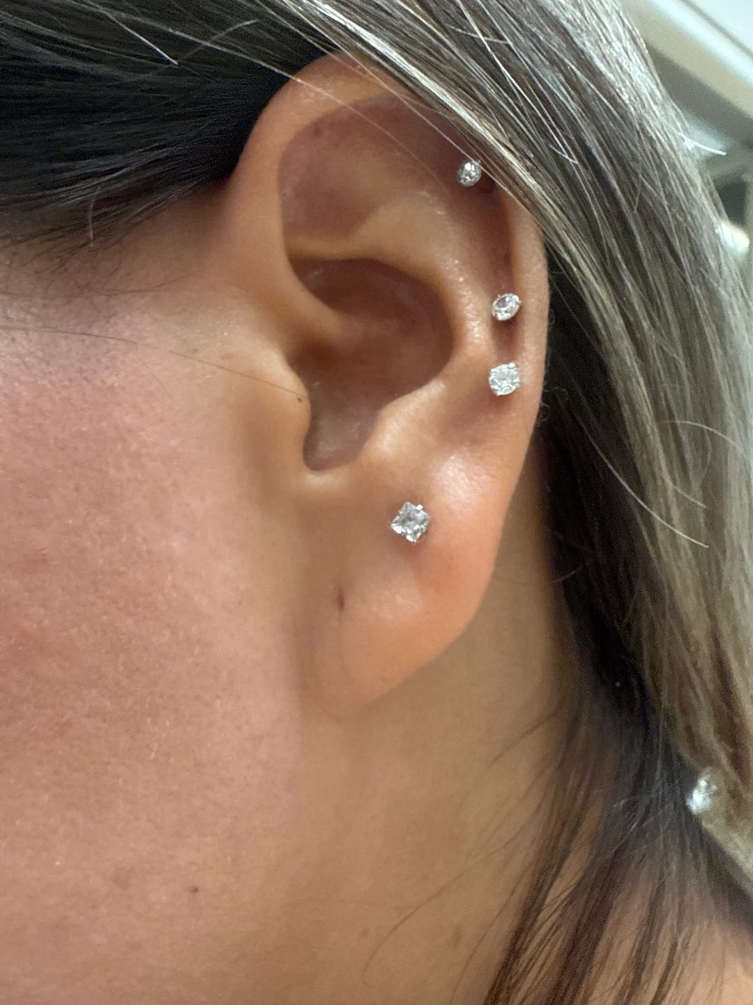 Customer photo review of Arete Plateado Acero Inoxidable Primera Perforacion