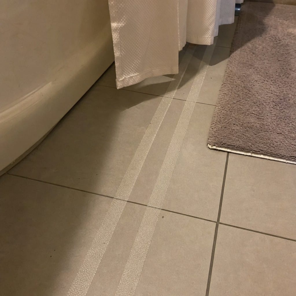 Customer photo review of Clear Anti-Slip Tape | Transparent | Silicon Carbide | 18.3m Roll | Tiles, Glass & Wood