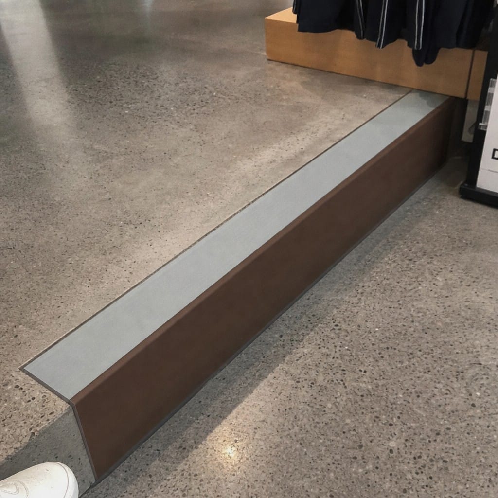 Customer photo review of Rake Back Aluminium Stair Nosing 2.44m 56mm Tread PVC Insert