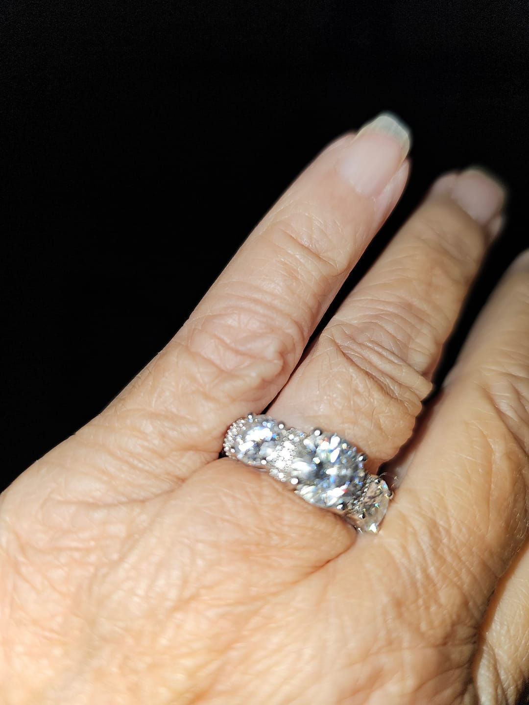 Customer photo review of Vintage Three Stone Round Moissanite Art Deco Engagement Ring