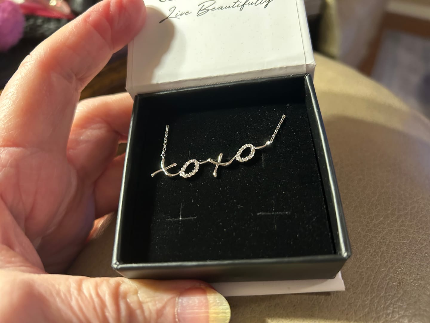 Customer photo review of Jocelyn 18k White Gold Plated XOXO Pendant Necklace with Swarovski Crystals