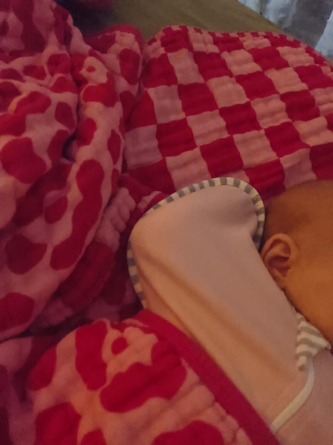 Customer photo review of Organic Muslin Burp Clothes in Bubble Gum Leopard - 3 Pack