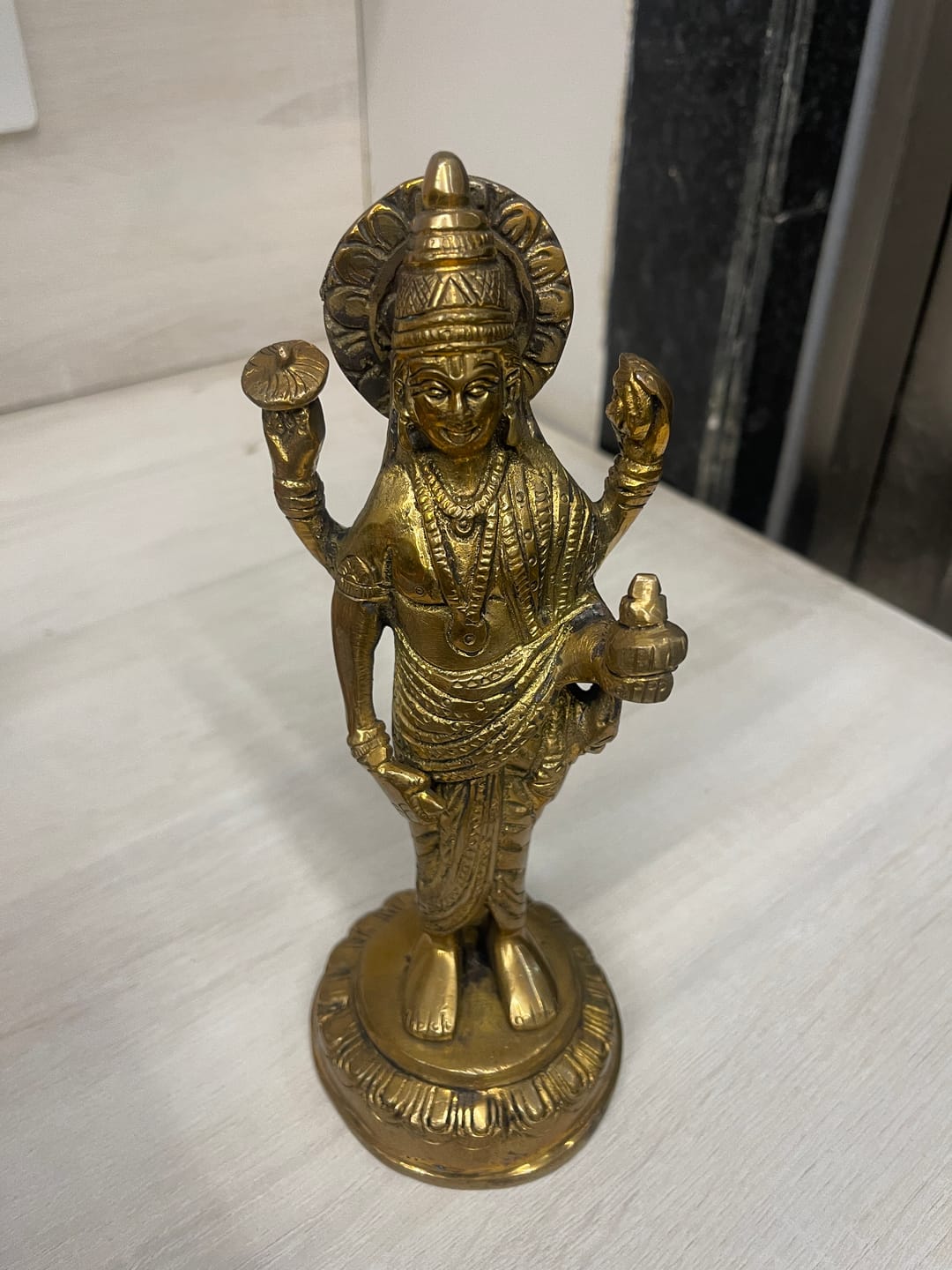 Customer photo review of Pure Brass Dhanvantri Ji Idol Vastu Remedy for Health, Healing and Positive Energy for Home and Office | 9 x 3.5 x 20 cm | 1.10 kg