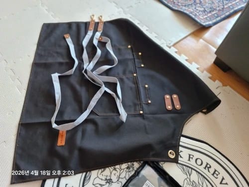 Customer photo review of Tablier de Potier