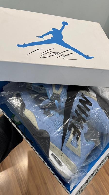 Customer photo review of Air Jordan 4 Retro "University Blue"
