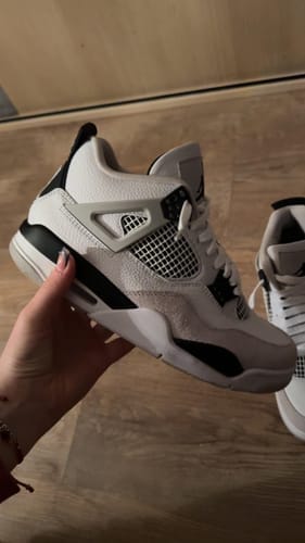 Customer photo review of Air Jordan 4 Military Black