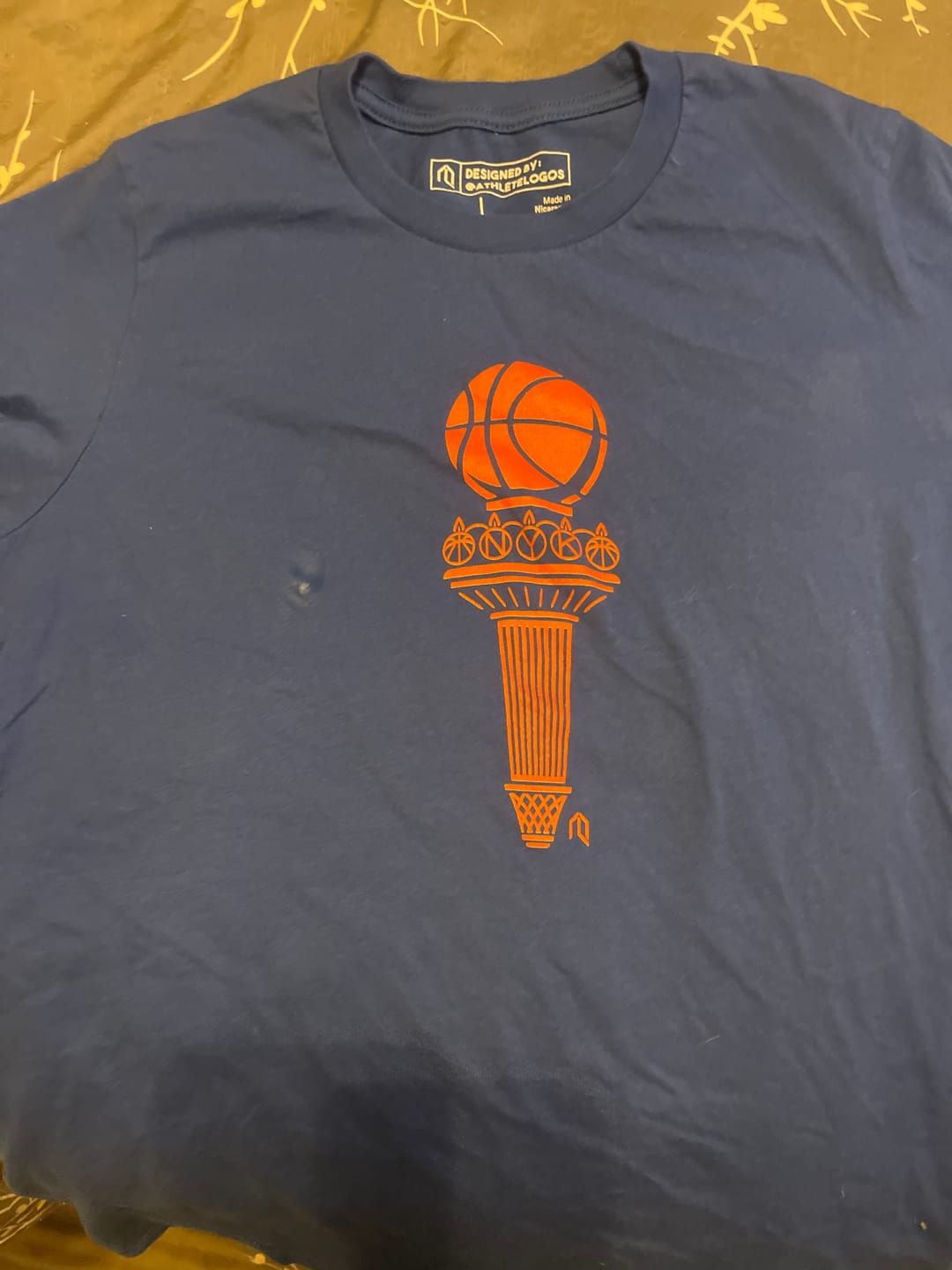 Customer photo review of NYK Basketball Torch T-Shirt