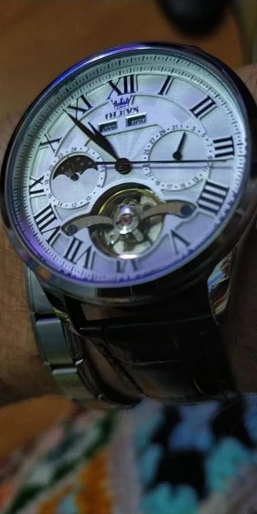 Customer photo review of OLEVS 7013 Men's Automatic Mechanical Watch – Moon Phase, Roman Numeral