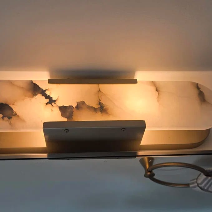 Customer photo review of Alabaster Wall Sconce with Gold Metal Frame