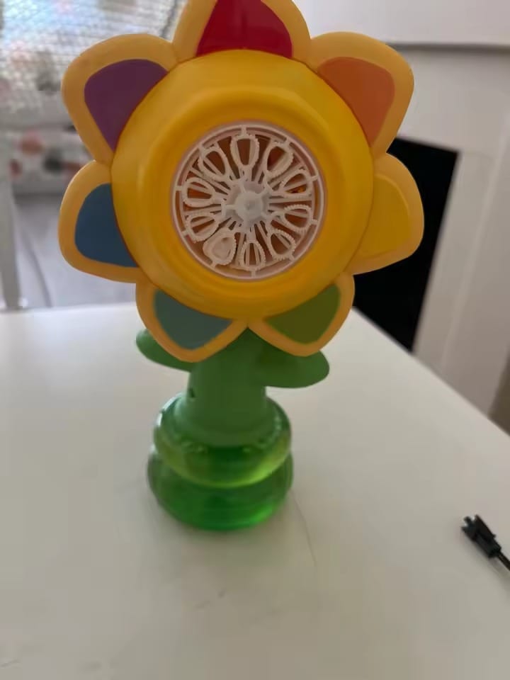 Customer photo review of BloomBubble™ Dancing Sunflower Bubble Machine — Lights Up & Swings
