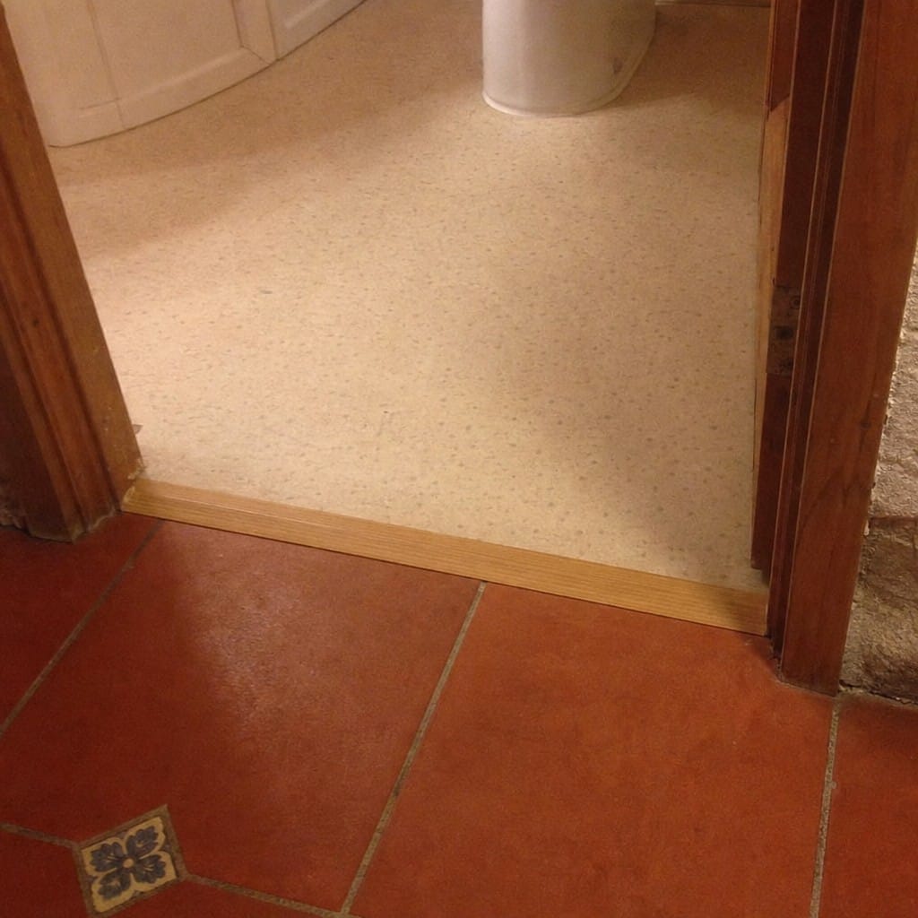 Customer photo review of Wood Effect Door Threshold Ramp 31mm Self Adhesive Aluminium