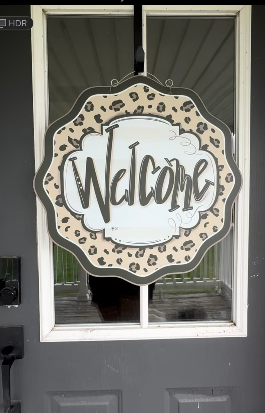 Customer photo review of Leopard Cheetah Welcome Door Hanger
