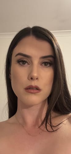 Customer's natural look with Infinaluxe Pre-mapped Segment Lash Extensions applied on both eyes.