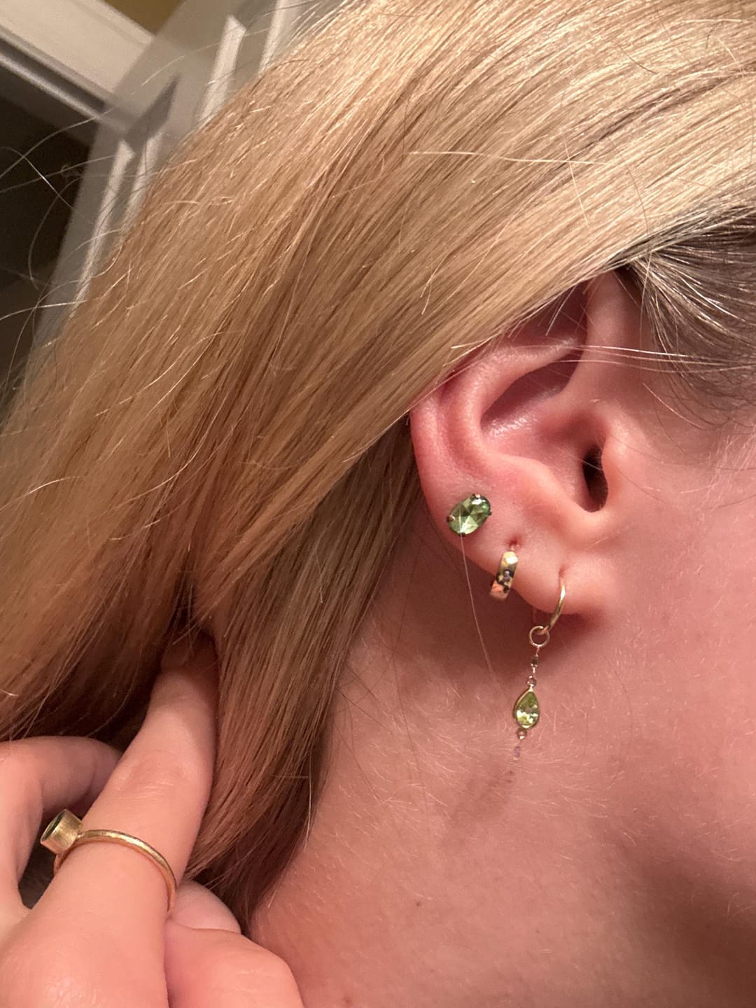 Customer photo review of Quiet Hold Huggie Earrings