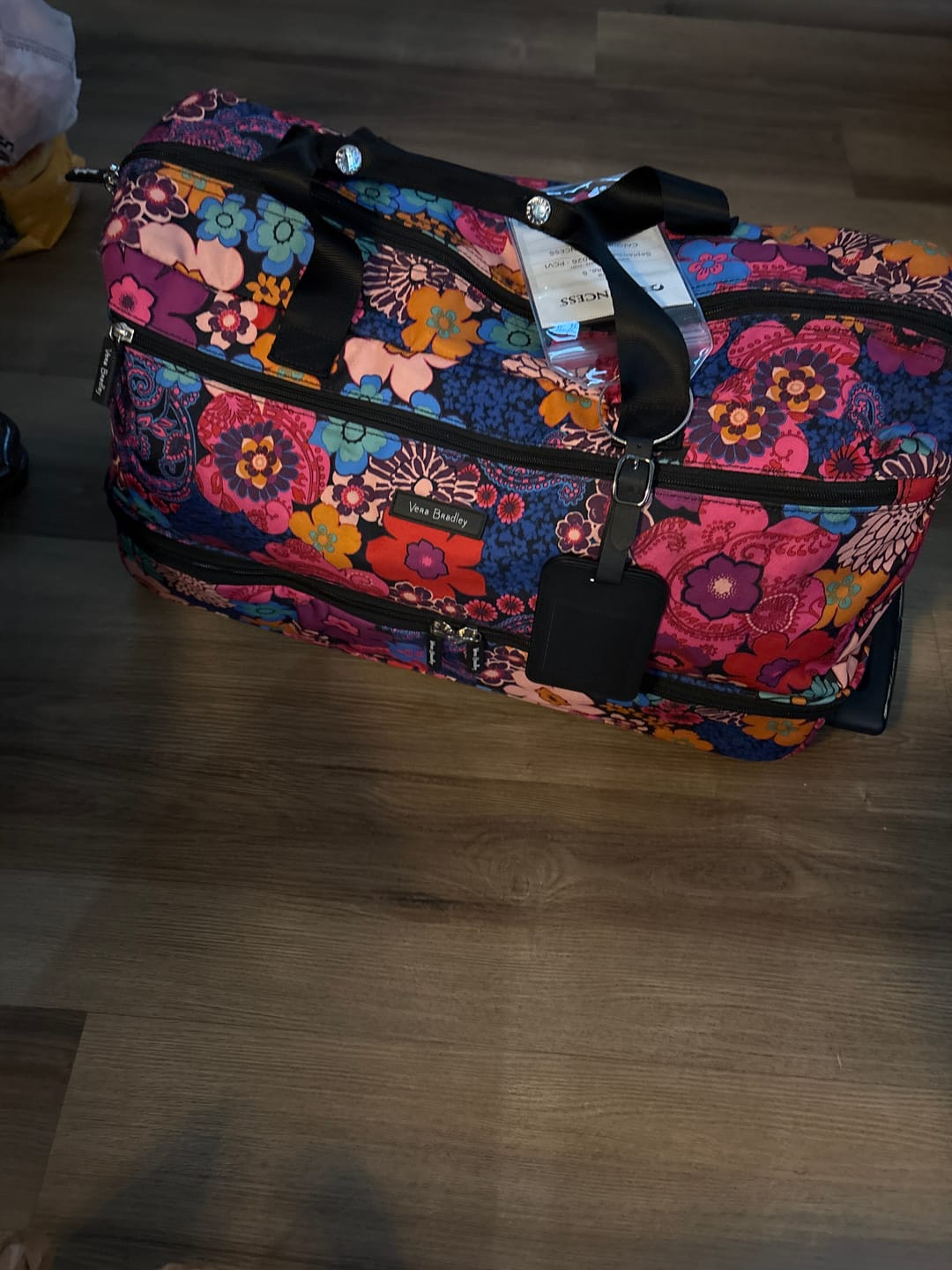 Customer photo review of Trackable Luggage Tag
