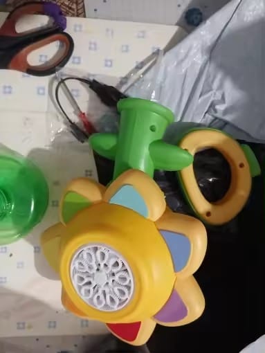 Customer photo review of BloomBubble™ Dancing Sunflower Bubble Machine — Lights Up & Swings