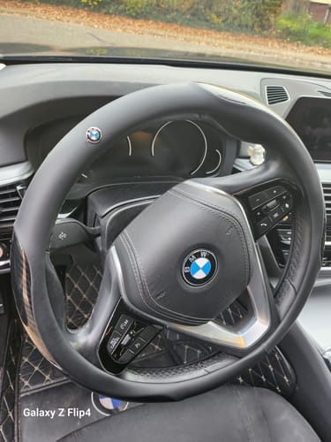 Customer photo review of Personalisierte Lederabdeckung für das Auto-Lenkrad