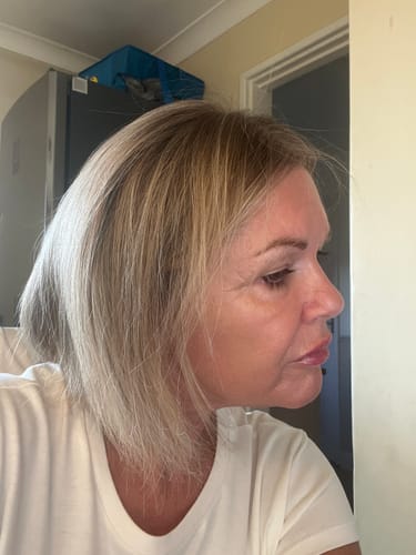 Woman with shoulder-length blonde hair, customer photo