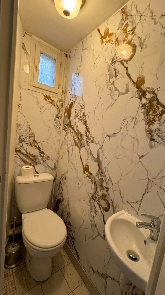 Customer photo review of Panneau PVC - Effet Marbre Blanc Doré - 250 x 120 cm – 100% Imperméable - 15 ans Garantie