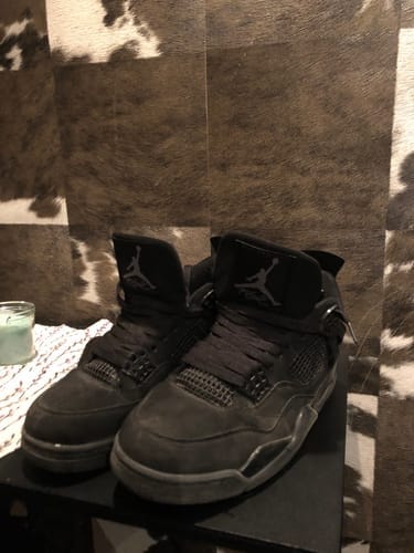 Customer photo review of Air Jordan 4 Black Cat