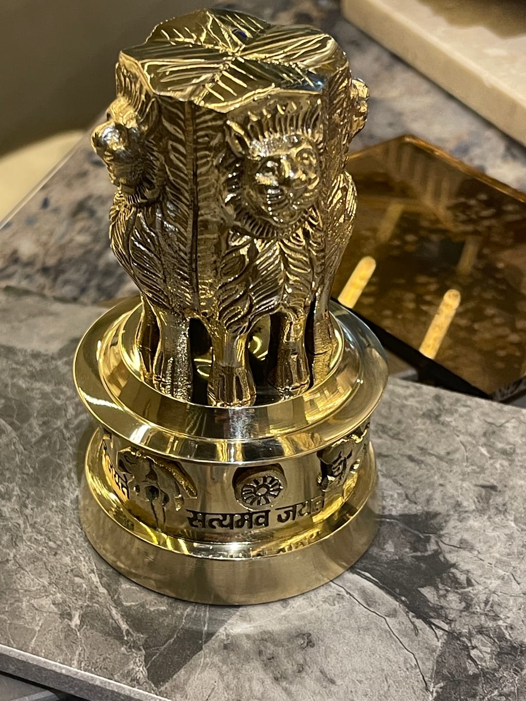 Customer photo review of Brass Ashoka Stambh Idol Vastu Remedy for Authority, Recognition and Government Support for Home, Office Desk and Institutional Spaces | 3 - 7 inch |