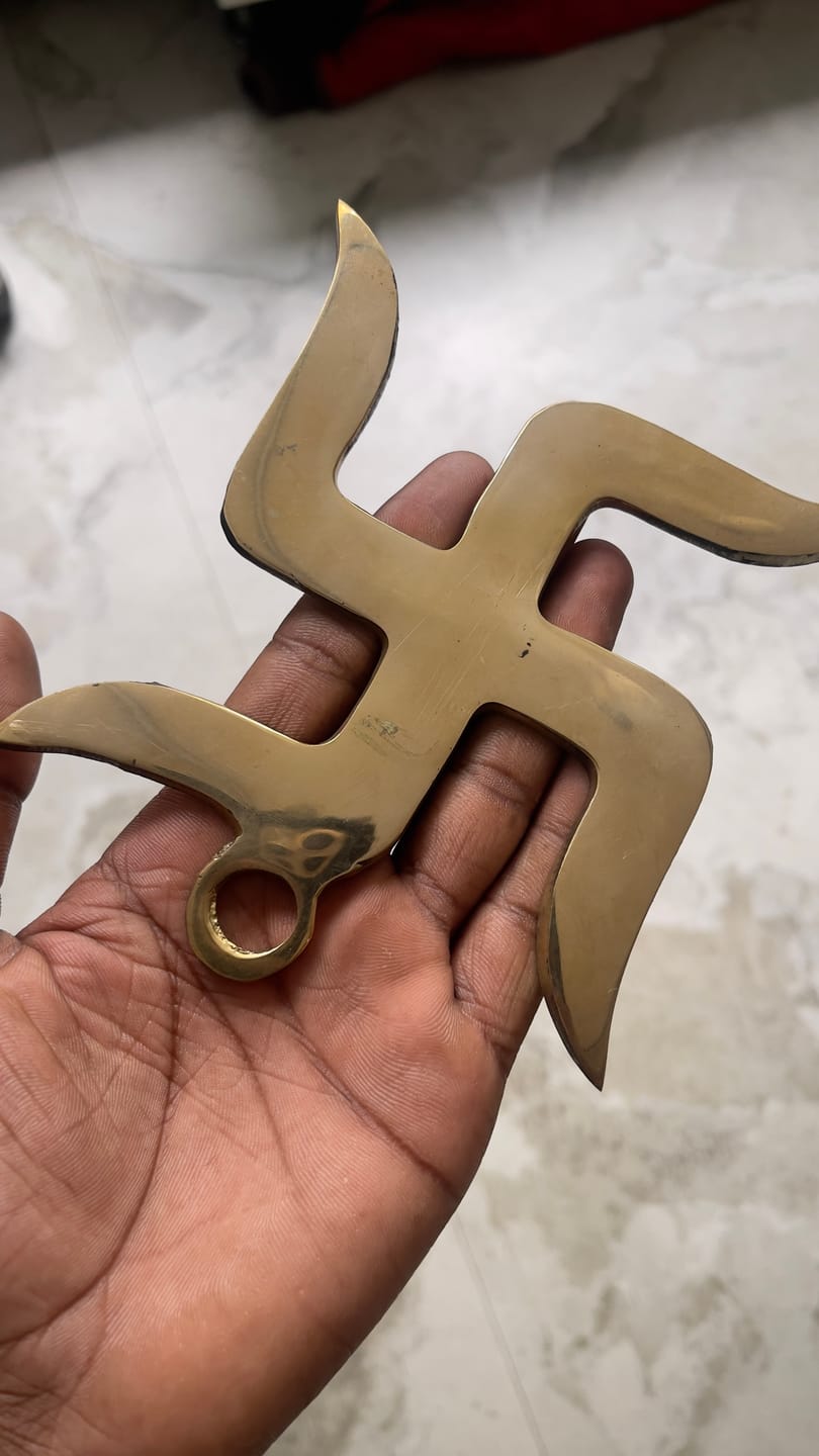 Customer photo review of Brass Swastik Wall Symbol | Vastu Remedy for Main Entrance & Auspicious Energy | 5 & 9 Inch