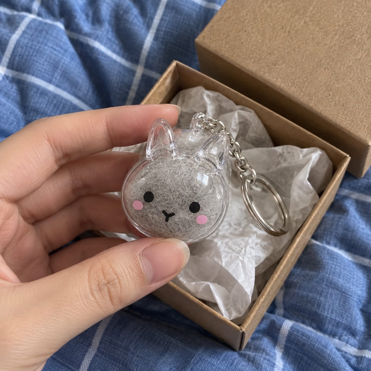 Customer photo review of Keepsake Keychain That Holds Your Bunny's Fur