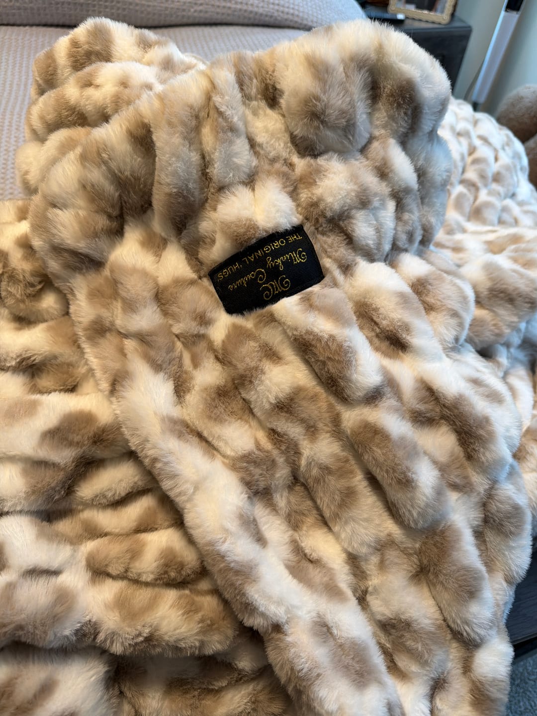 Customer photo review of Hugs Snow Leopard Blanket